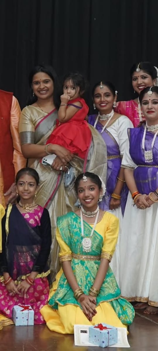 Group performance ensemble on stage